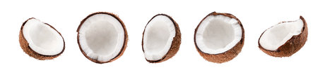 A set of beautifully retouched coconut halves isolated on white