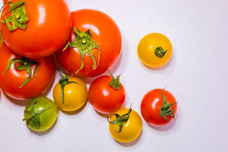 Colorful tomatoes with white backgroundの写真素材