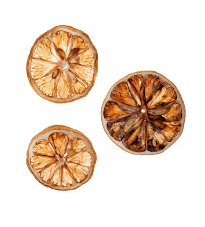 dry slices of lemon on white background isolatedの写真素材