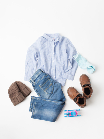 Set autumn children's clothing on a white background. An empty space to insert text.の写真素材