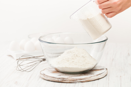 Preparation of the dough. A measurement of the amount of flour in the recipe. Ingredients for the dough.の写真素材
