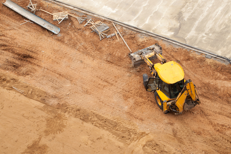 Construction of a multi-storey building and equipment around. Use of technology. Copy space text