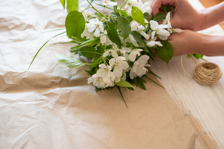 Image of a bouquet of ornamental herbs and Jasmine branches. Copy space textの写真素材