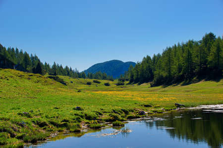 mountain landscape with lake and mountainsの写真素材