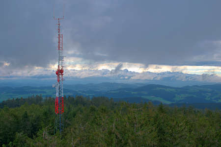 View from the lookout tower Breitenstein in Kirchschlag towards the sent-towers during storms and rainの写真素材