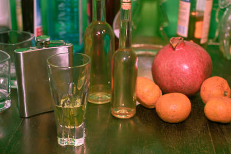 still life with glass of wine and fruitsの写真素材