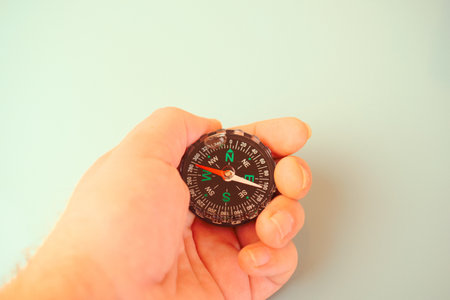 hand holding a compassの写真素材