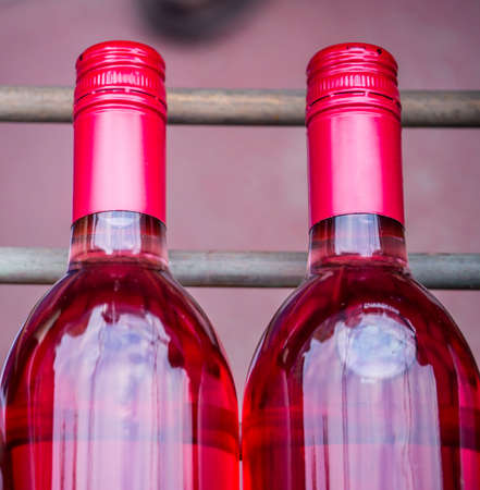 wine bottles on a rackの写真素材