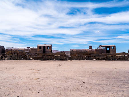 Railroad graveyard in Uyuni Bolivia. Full of abandoned trains - tourist destinationの写真素材