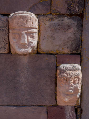 Head sculptures at the ancient ruins of Tiwanaku bolviia on the altiplano - high plainの写真素材