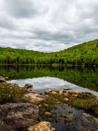 a lake in the wilderness of the adirondack mountains in New Yorkの写真素材