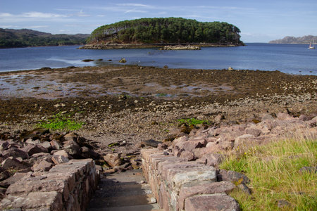 Scenic view of Shieldaig loch and island with blue sky and cloudscape background, Highlands, Scotland.の写真素材