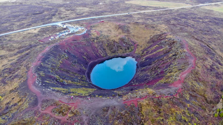 Aerial view of Kerid, is a beautiful crater lake of a turquoise color located on the South-West of Icelandの写真素材