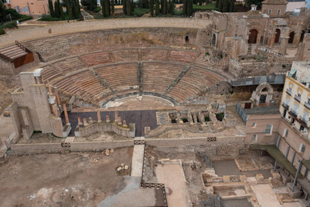 Aerial view of the Roman theater of Cartagena and its surroundings on a cloudy dayの写真素材