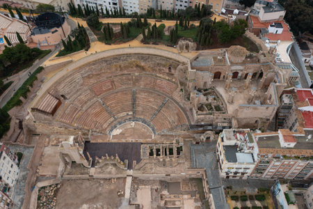 Aerial view of the Roman theater of Cartagena and its surroundings on a cloudy dayの写真素材