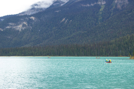 Visitors kayaking in Maligne Lake in Jasper National Park.の写真素材