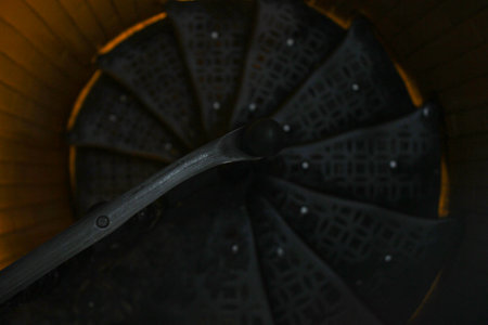 Spiral metal stairs. Metal stairs spiraling downの写真素材