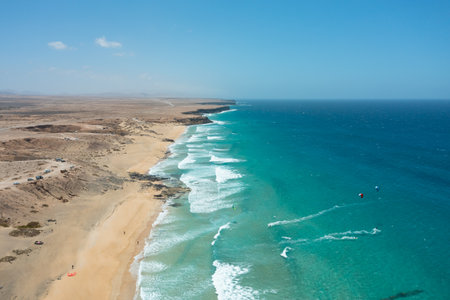 Spectacular aerial view of Playa del Castillo in Caleta de Fuste, Fuerteventura, Canary Islands. The...