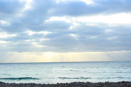 Scenic view of a stone beach in Fuerteventura, Canary Islands, Spain. Coastal landscape with rocky...