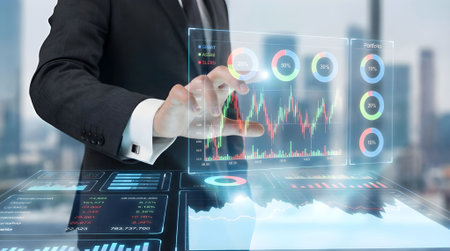 Close up of businessman touching virtual panel with forex chart on itの素材