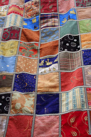 Colorful patchwork quilt blanket backgroundの写真素材
