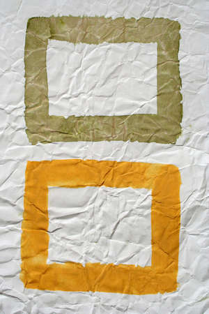 Painted frames on wrinkled background.