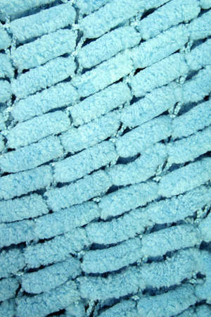 cyan color knitted wool backgroundの写真素材