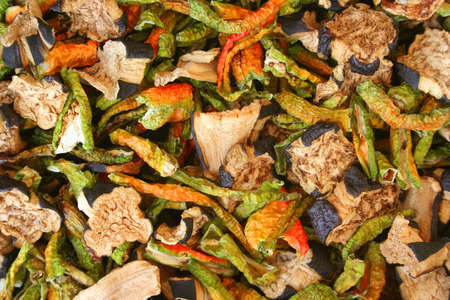 Dried pepper and sliced eggplant as backgroundの写真素材