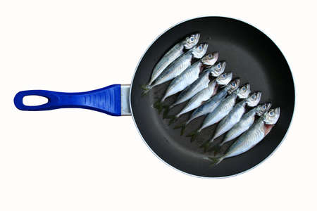 fish in the pan, ready to cookの写真素材
