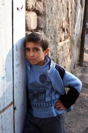 Homeless boy with his home patterned の写真素材
