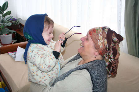 grand mother and grand son together, happy family portraitの写真素材