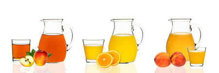 Apple, orange and peach juices in glasses and decanters on a white background with reflection. Photo collage.の写真素材