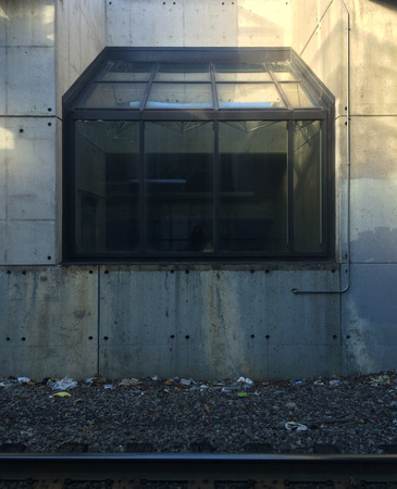 Glass enclosure at commuter rail stationの写真素材