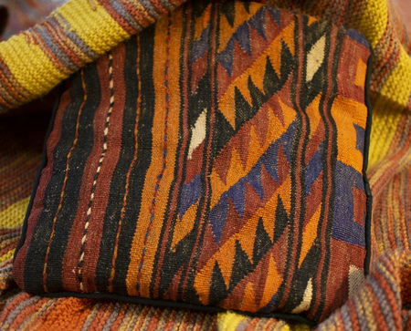 Pillow and blanket with warm colorsの写真素材