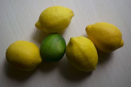 Lemons and lime on boardの写真素材