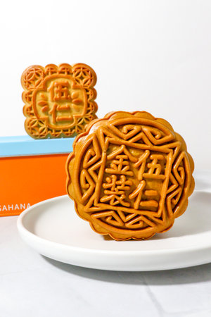 Moon cakes for Chinese mid-autumn festival on white background.の写真素材