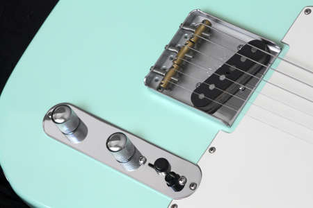 Detail microphone and knobs of turquoise telecaster electric guitarの写真素材