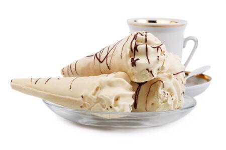 biscuit rolls with cream and a cup of coffeeの写真素材