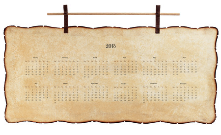Old, decrepit calendar 2015 with charred edges, grunge  Isolated on white の写真素材