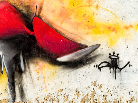KASIMOV - JULY 24: Detail of graffiti on the wall of the old building. Grungy concrete surface with cracks, scratches and streaks of paint. July 24, 2015 in Kasimov, Russiaのeditorial素材