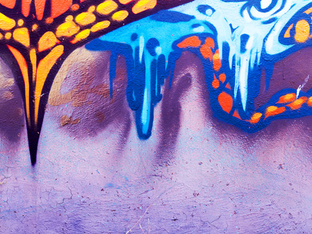 ODESSA - SEPTEMBER 15: Detail of graffiti on the wall of the old building. Grungy concrete surface with cracks, scratches and streaks of paint. September 15, 2015 in Odessa, Ukraineのeditorial素材