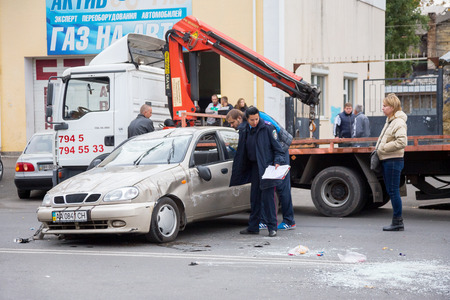 ODESSA, UKRAINE - OCTOBER 24, 2015: car hauler picks up after a car accident October 24, 2015 in Odessa, Ukraineのeditorial素材