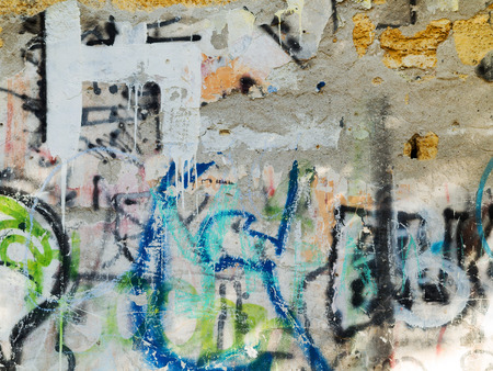 ODESSA - NOVEMBER 1: Detail of graffiti on the wall of the old building. Grungy concrete surface with cracks, scratches and streaks of paint. November 1, 2015 in Odessa, Ukraineのeditorial素材