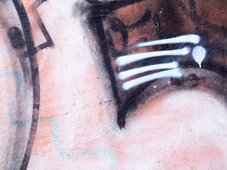 ODESSA - NOVEMBER 4: Detail of graffiti on the wall of the old building. Grungy concrete surface with cracks, scratches and streaks of paint. November 4, 2015 in Odessa, Ukraineのeditorial素材