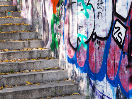 VARNA - November 13: Detail of graffiti on the wall of the underpass in autumn Perspective. Grungy concrete surface with cracks, scratches and streaks of paint. November 13, 2015 in Varna, Bulgariaのeditorial素材