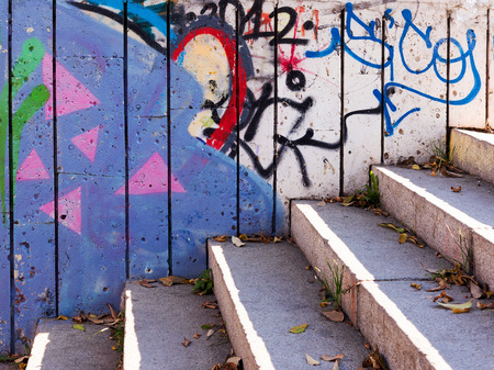 VARNA - November 13: Detail of graffiti on the wall of the underpass in autumn Perspective. Grungy concrete surface with cracks, scratches and streaks of paint. November 13, 2015 in Varna, Bulgariaのeditorial素材