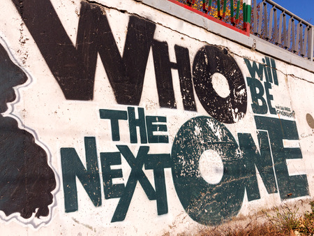 VARNA - NOVEMBER 11: Detail of graffiti on the wall of the old building. Grungy concrete surface with cracks, scratches and streaks of paint. November 11, 2015 in Varna, Bulgariaのeditorial素材