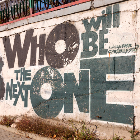 VARNA - NOVEMBER 11: Detail of graffiti on the wall of the old building. Grungy concrete surface with cracks, scratches and streaks of paint. November 11, 2015 in Varna, Bulgariaのeditorial素材