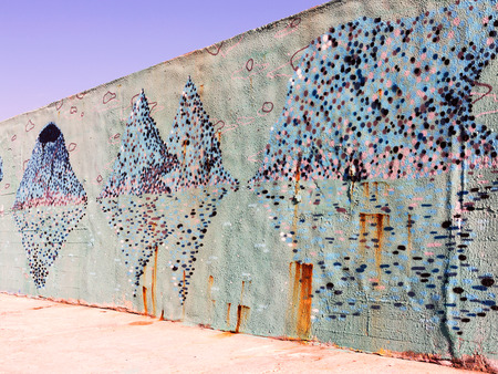 VARNA - 18 November: Detail of graffiti on a concrete wall Perspective. Grungy concrete surface with cracks, scratches and streaks of paint. November 18, 2015 in Varna, Bulgariaのeditorial素材