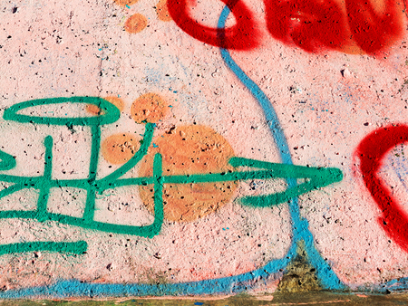 VARNA - 18 November: Detail of graffiti on a concrete wall Perspective. Grungy concrete surface with cracks, scratches and streaks of paint. November 18, 2015 in Varna, Bulgariaのeditorial素材